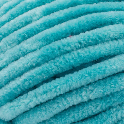Soft Premier Parfait Chunky yarn in a large skein, showing the thick, velvety chenille texture in lagoon green colour