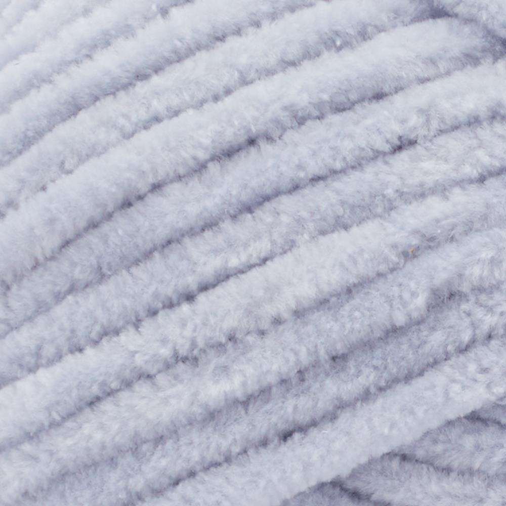 Close-up of Premier Parfait Chunky polyester yarn, highlighting the dense, plush pile and vibrant color in cloudy day grey colour