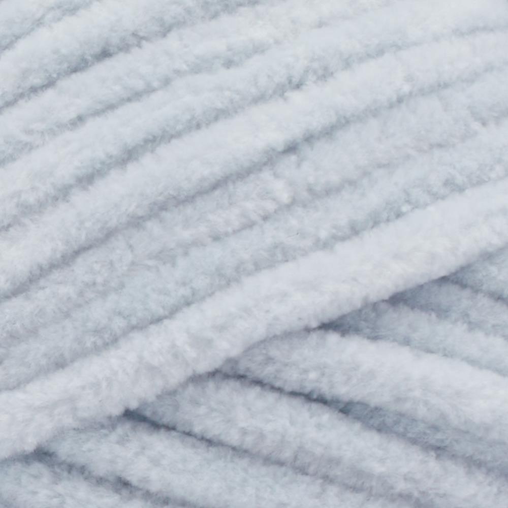 A plush skein of Premier Parfait Chunky chenille yarn showcasing its thick, velvety texture. The image highlights the super bulky #6 weight and the vibrant matte finish of the polyester fibers, ideal for creating soft toys, cozy blankets, and kid-friendly crochet projects in pale grey colour