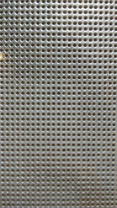 A professional-grade sheet of 14-count perforated paper, specifically designed for cross-stitch and needlework. The high-definition paper features precision-punched holes at 14 stitches per inch, mimicking the grid of Aida cloth but with a firm, card-like structure available in Metallic Silver