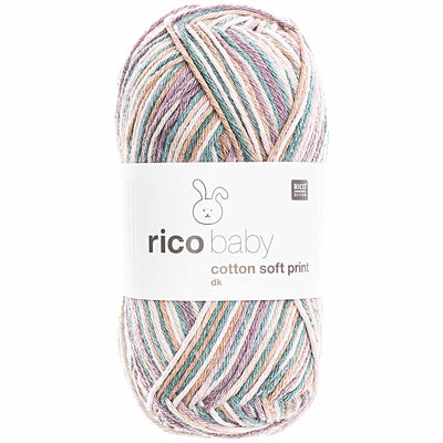 A skein of Rico Baby Cotton Soft Print DK yarn in a variegated pink, blue, green, and white color pattern. 
Rico Baby Cotton Soft Print DK (50g) – Ultra-Soft, Self-Patterning Cotton Blend for Baby & Toddler Knits, in multicolour teal
