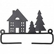 A metal craft hanger with a silhouette of a house and trees, used for displaying quilt blocks or craft patterns.