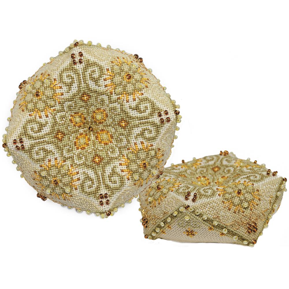 A specialized Riolis cross-stitch kit for creating a 3D biscornu cushion. The design features a delicate 'Fantasy' motif stitched on premium beige 25-count Zweigart Lugana fabric. The kit includes Anchor cotton threads, shimmering metallic accents, two types of decorative beads, and polyester stuffing to complete the project