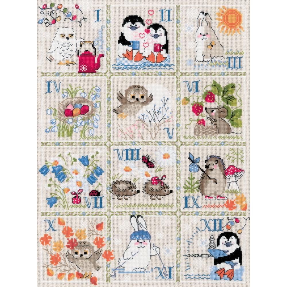 A cross stitch kit image featuring a variety of cute forest animals and Roman numerals, completed as a quilt.