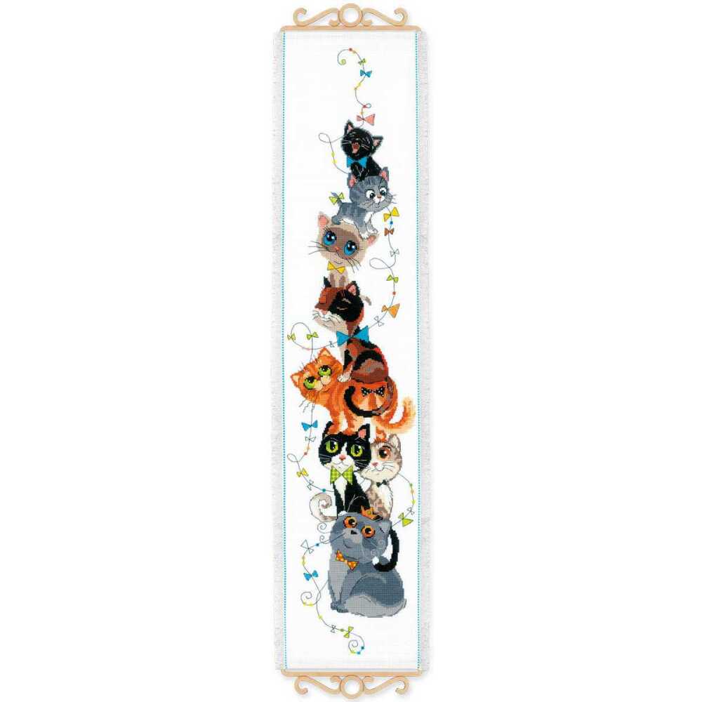 Cross stitch kit depicting a series of colorful cat designs on a white fabric background, with a blue border at the top.