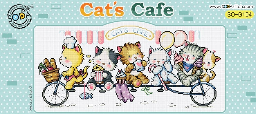 A colorful cross stitch kit image depicting cartoon cats in a cafe setting, with various cats engaging in different activities like drinking coffee and eating.