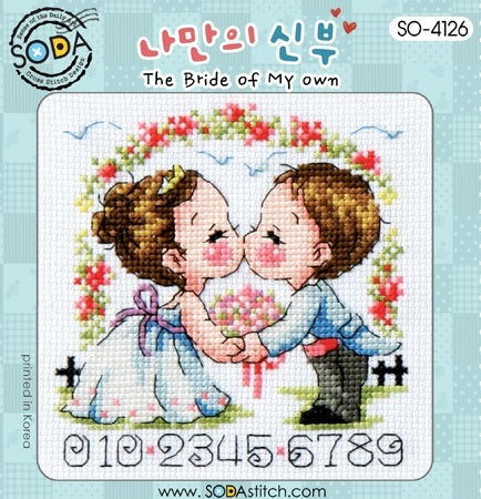 A perfectly square, small-format cross-stitch kit from SODA (Korea) titled 'The Bride of My Own.' The design features a whimsical, illustrative bride motif in a soft, modern color palette with delicate floral accents. The kit includes 14-count white Aida cloth, full skeins of DMC embroidery threads, and a needle. The design measures 60 stitches wide by 60 stitches high