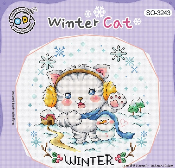 A square-format seasonal cross-stitch kit from SODA (Korea) titled 'Winter Cat.' The design features several whimsical, illustrative cats in winter attire, surrounded by snowflakes, hot cocoa, and cozy seasonal motifs. The kit includes 14-count white Aida cloth, full skeins of DMC embroidery threads, and a needle. The finished design measures 19.5 cm by 19.5 cm