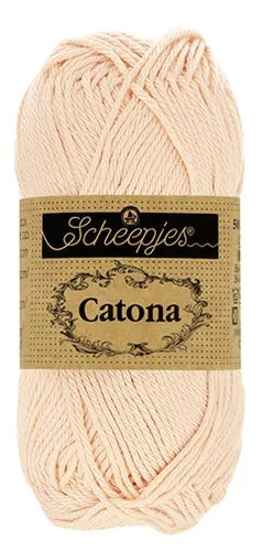 A ball of Scheepjes Catona 50g cotton; a breathable, machine-washable natural fiber yarn perfect for summer tops, baby blankets, and colorful mandalas