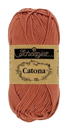 A ball of Scheepjes Catona 50g cotton; a breathable, machine-washable natural fiber yarn perfect for summer tops, baby blankets, and colorful mandalas