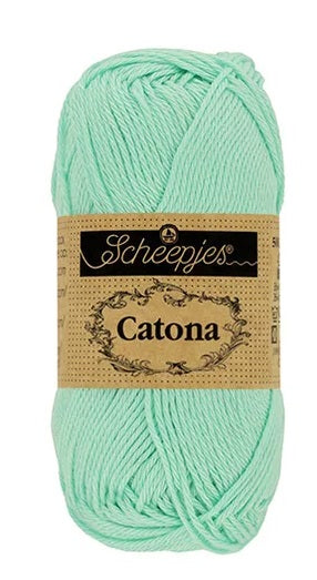 A ball of Scheepjes Catona 50g cotton; a breathable, machine-washable natural fiber yarn perfect for summer tops, baby blankets, and colorful mandalas