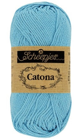 Close-up of Scheepjes Catona 50g cotton showing the smooth, fuzz-free texture and vibrant Sky Blue tone for high-definition stitch work