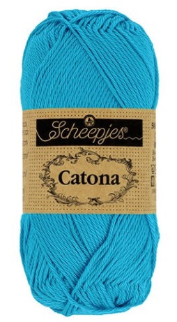 Close-up of Scheepjes Catona 50g cotton showing the smooth, fuzz-free texture and vibrant Vivid Blue Color tone for high-definition stitch work