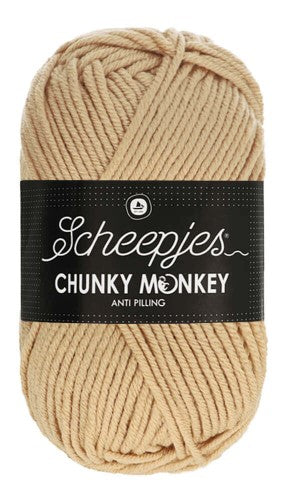 Extreme close-up of the Chunky Monkey yarn strands, highlighting the high-quality anti-pilling acrylic fibers that ensure a smooth, fuzz-free finish for long-wearing garments in camel colour