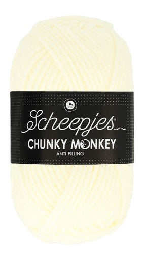 A lush, oversized ball of Scheepjes Chunky Monkey Aran yarn in a vibrant solid color, featuring a thick, smooth twist and a subtle silky sheen in cream colour