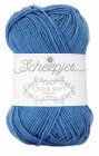 A skein of Scheepjes Linen Soft yarn in Demin blue color, with brand label visible.