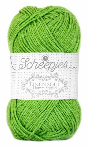 A skein of Scheepjes Linen Soft yarn in spring green color, with brand label visible.
