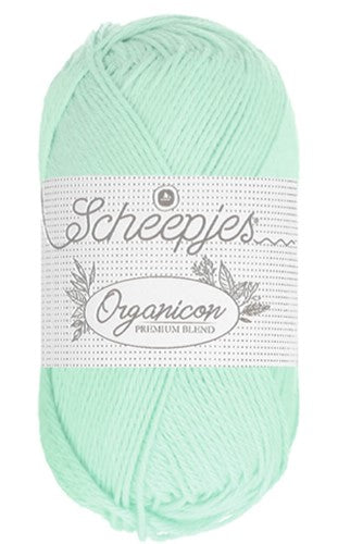 Close-up of the Scheepjes Organicon fibers, highlighting the clean, high-quality plies of sustainable cotton. in mint