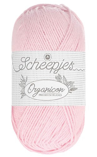 A collection of Scheepjes Organicon colors, showing the naturally inspired and vibrant tones available in this eco-friendly range in light pink