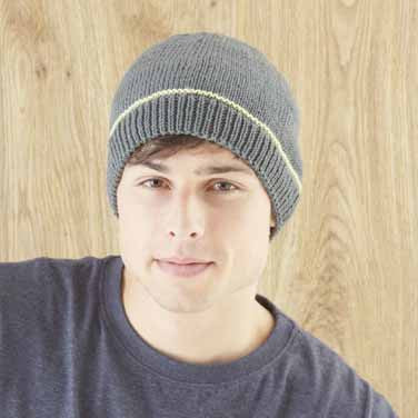 A men wearing a beanie made from the pattern. A montage of designs from Booklet 694, showing a variety of garments for children and adults, plus colorful home furnishing accessories.