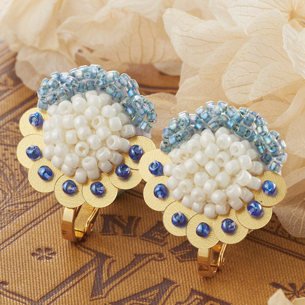 A DIY bead embroidery jewelry kit by TOHO, featuring a "Maison De Broderie" design for creating elegant, handmade stud earrings with a vintage French flower couture look