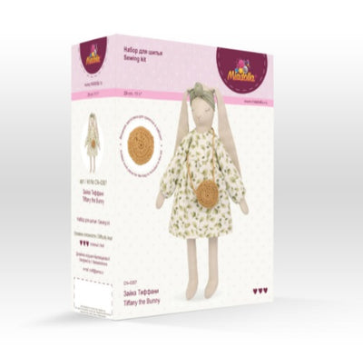 Close-up of the premium linen fabric and cotton mouline threads included in the Tiffany the Bunny sewing kit