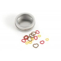 A premium set of 15 heart-shaped knitting stitch markers by Tulip Needle Company, neatly organized in a pocket-sized metal storage tin.