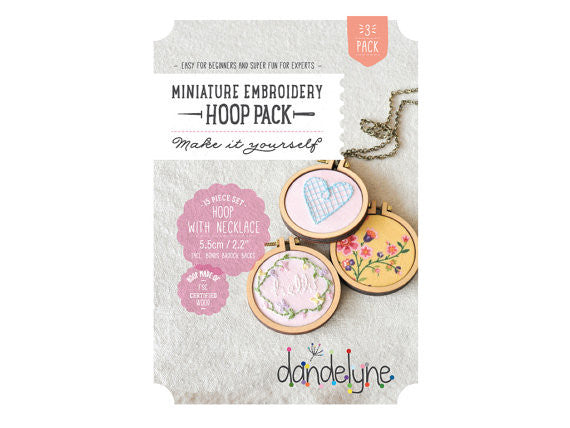 Packaging of Dandelyne 2.2 inch miniature embroidery hoop pack, displaying the hoops with example embroidery, screw, bolt, and chain components.