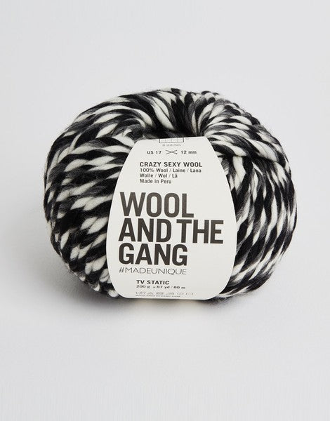 Close-up of Crazy Sexy Wool, highlighting the natural matte texture and the incredible scale of the super-chunky wool twist in black and white twist.