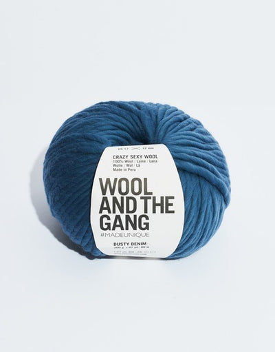 Close-up of Crazy Sexy Wool, highlighting the natural matte texture and the incredible scale of the super-chunky wool twist in Dusty Denim