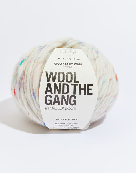 Close-up of Crazy Sexy Wool, highlighting the natural matte texture and the incredible scale of the super-chunky wool twist, in Mix-it-up white colour