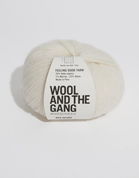 Close-up of Feeling Good yarn, highlighting the delicate Baby Alpaca fibers held within a fine cage structure for a weightless, cloud-like feel in ivory white colour