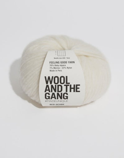 Close-up of Feeling Good yarn, highlighting the delicate Baby Alpaca fibers held within a fine cage structure for a weightless, cloud-like feel in ivory white colour