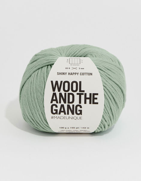 A 100g ball of Wool and the Gang Shiny Happy Cotton yarn in a vibrant mauve shade, showing its smooth texture and subtle natural sheen. Best Cotton Yarn for Summer, Luxury Aran Cotton, WATG Yarn Singapore.
