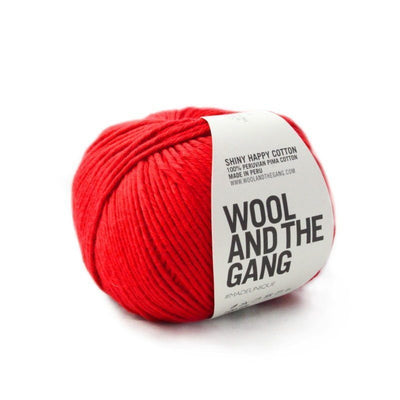 Macro view of the 100% Pima cotton fibers, highlighting the sleek, pilling-resistant surface and high-definition twist in lipstick red colour
