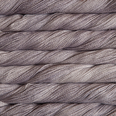 Hand-Dyed Lace Weight Yarn, Luxury Silk Knitting Fiber, Malabrigo Singapore.
A 50g skein of Malabrigo Silpaca yarn, showcasing its signature hand-dyed variegation and the luminous sheen of the silk-alpaca blend in Pearl colour