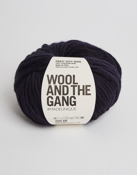 Close-up of Crazy Sexy Wool, highlighting the natural matte texture and the incredible scale of the super-chunky wool twist in midnight blue colour