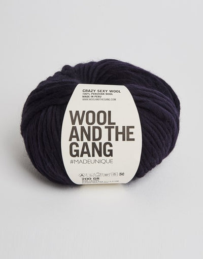 Close-up of Crazy Sexy Wool, highlighting the natural matte texture and the incredible scale of the super-chunky wool twist in midnight blue colour