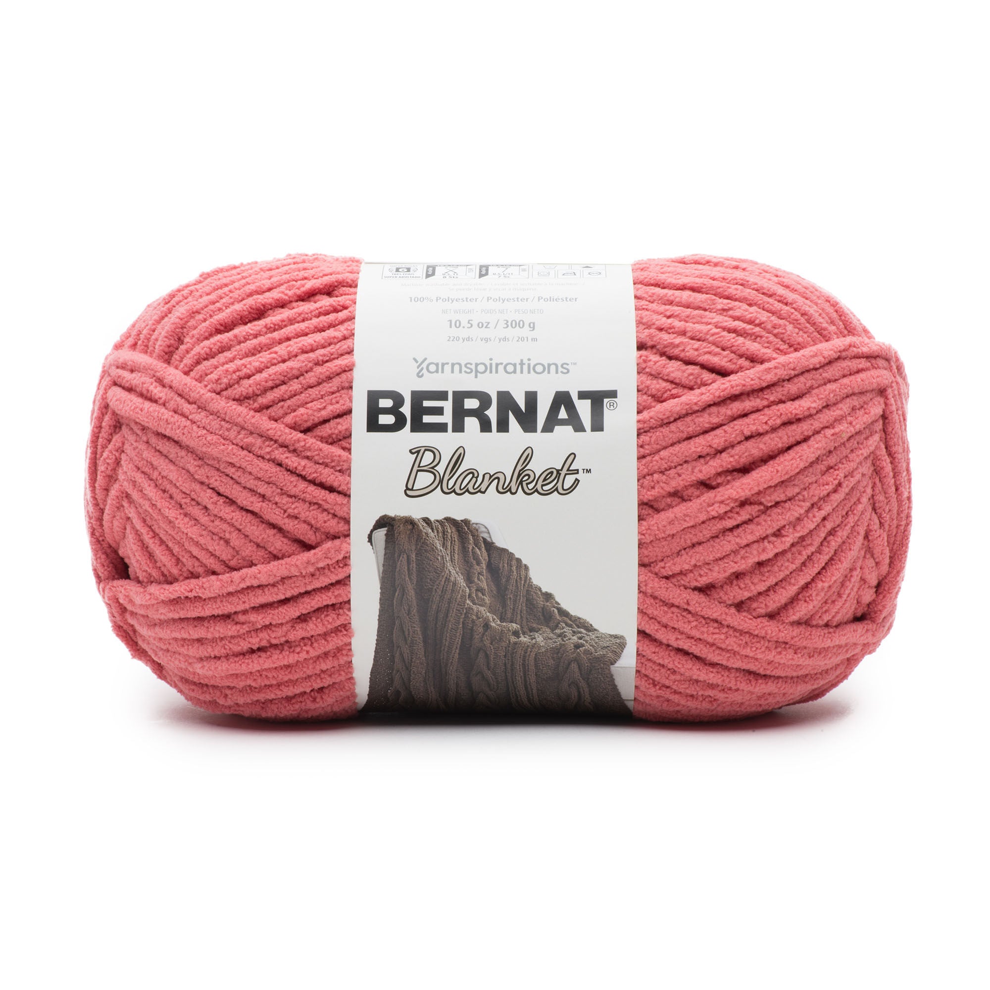 Close-up of Bernat Blanket yarn showing the plush velvety texture; a hypoallergenic and machine-washable yarn ideal for baby blankets and home decor. IN rose colour