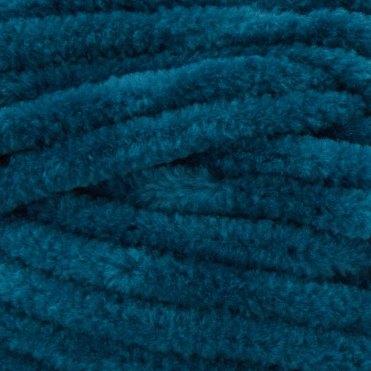 A soft, bulky weight Premier Parfait Chunky yarn perfect for making amigurumi and plush home decor in peacock green colour