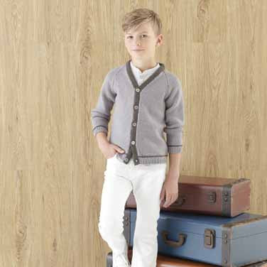 A young old wearing a knitted sweater.
A finished knitted piece from the booklet styled with casual chinos, illustrating the 'effortlessly stylish' weekend look of the collection