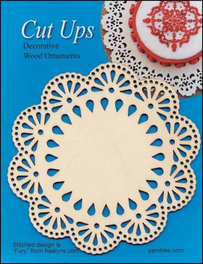 A circular cut-up decorative wood ornament with a lace pattern design, displayed against a blue background with a completed ornament in the top right corner.

Decorative Wood Cutouts, DIY Wood Gift Tags