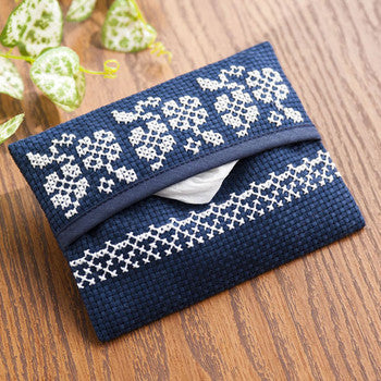 Close-up of the ready-made pouch construction, highlighting the clean stitching and the integrated Aida cloth panel in dark navy colour