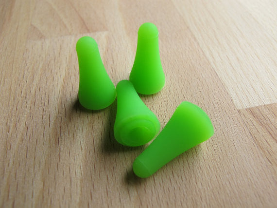 Close-up of the flexible silicone material, showing the Clover logo and the soft, grippy texture of the purple large-size protector.