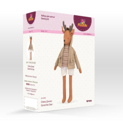 Close-up of the premium earthy-toned linen fabric and high-quality mouline threads included in the Daniel the Deer kit in a box